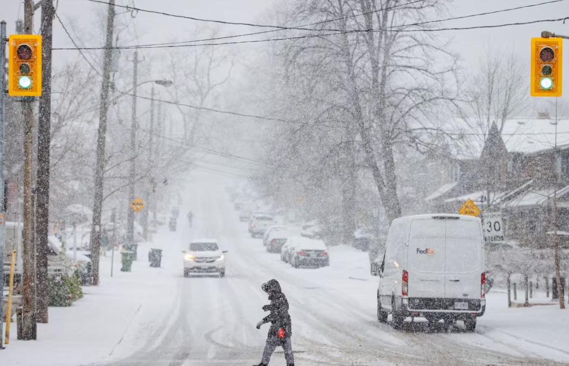 Heavy snow hits Toronto as winter storm disrupts travel, leading to cancelled flights, car crashes